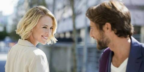 How to Talk to Women | Dating tips for men | Discover the Hidden Code to a Woman's Heart | Cute Blond Lady Looking back over her shoulder with a smile at a Bearded man in blue suit jacket with white T Shirt Smiling back at her.