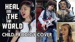 Image of Children Singing Michael Jacksons | Heal the World | Image with asian girl with headphones singing into microphone, another child on guitar and 2 more children singing with headphones on! Heal the World