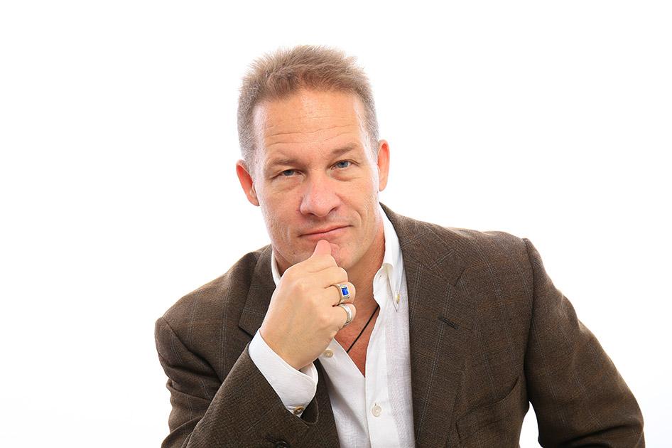 Mike Kollin Broken to Bulletproof life coach - professional portrait in Kiton dress shirt and jacket
